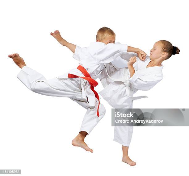 Punch In The Jump And Kick Leg Are Beating Sportsmens Stock Photo - Download Image Now