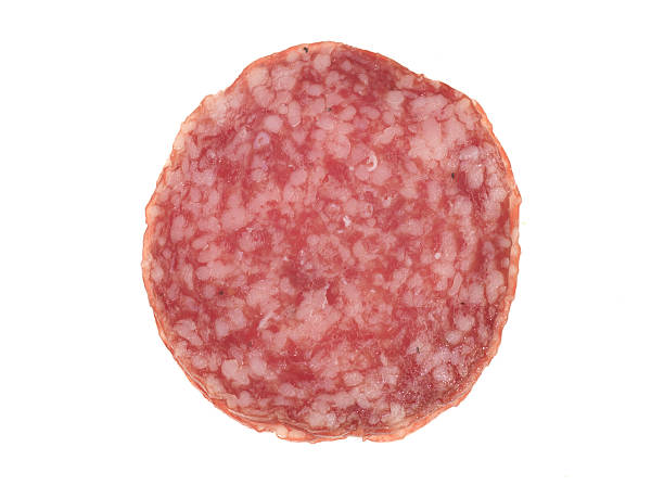 istock Sliced Milano Salami Against a White Background 484112224