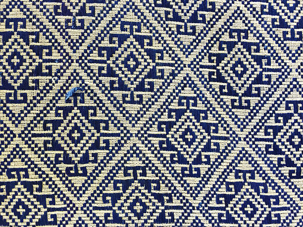 istock Colorful thai handcraft peruvian cutton style rug surface close up 484112236