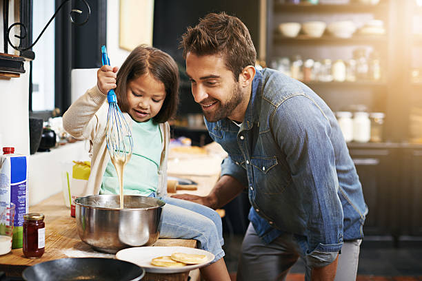 istock Showing dad a thing or two about cooking 484114742