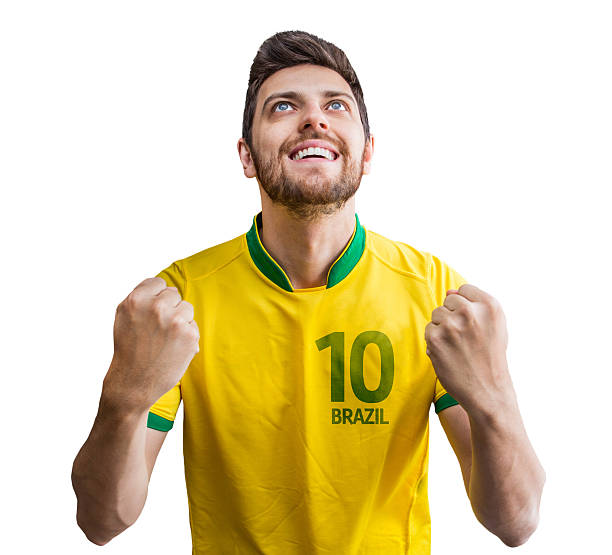 istock Brazilian soccer player celebrates on white background 484116030