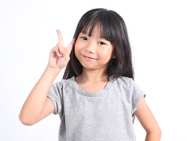 istock Little girl with her two finger 484116434