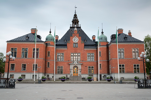 The Town House in Umea, Sweden with clouds in the background.