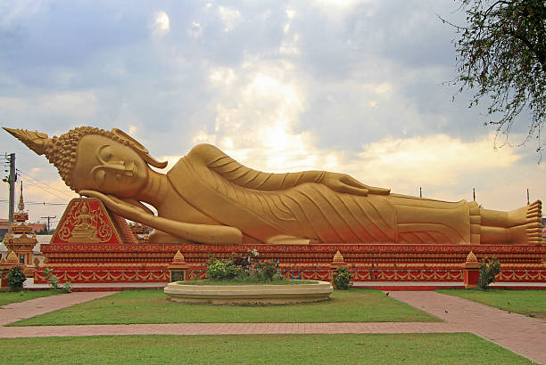 istock lying buddha in wat that luang tai 484122658