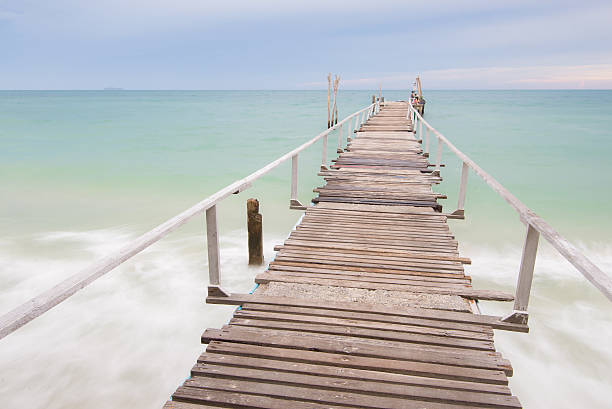 istock Wood Bridge on the beach 484124294