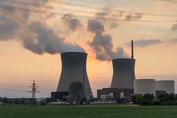 A running nuclear power plant photographed against the evening sky.