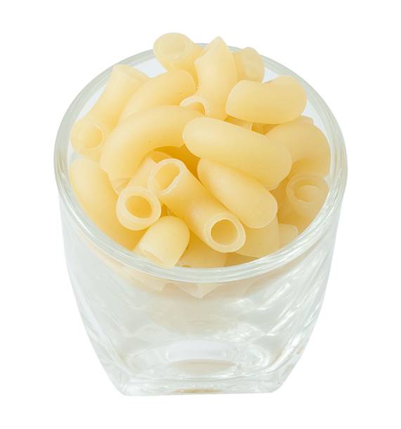 istock Cup of Raw Elbow Macaroni on White 484126616