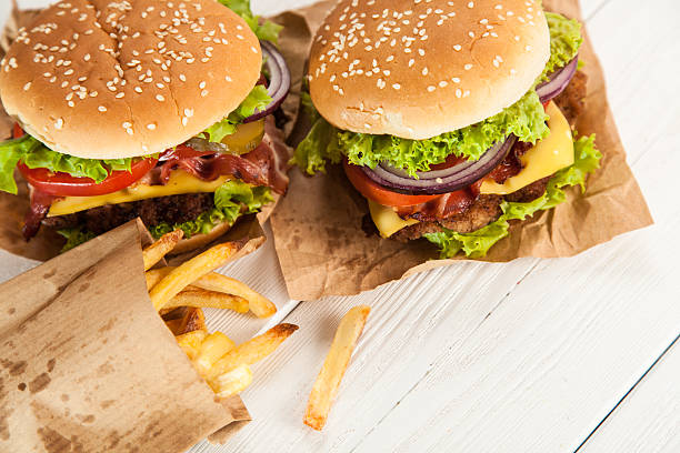 istock Delicious hamburger and fries 484129636