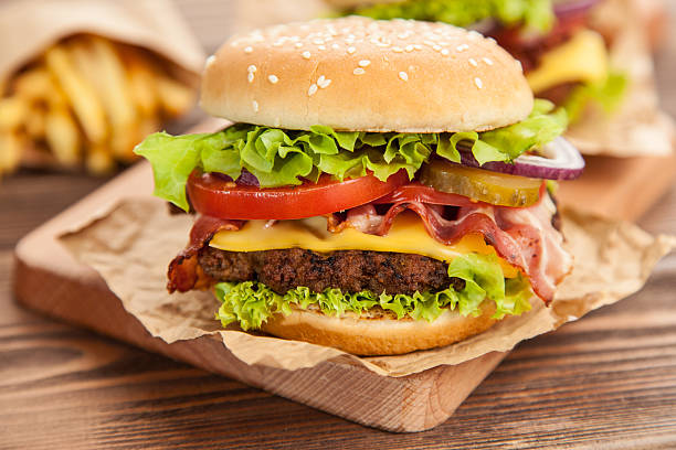 istock Delicious hamburger and fries 484129638