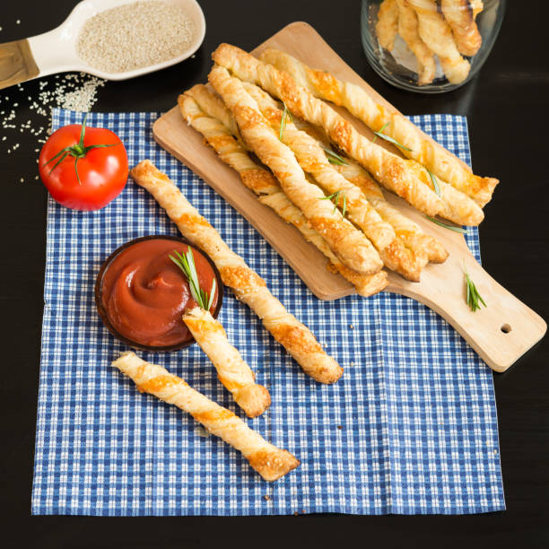 istock Food. Homemade baking. Bread products. Cheese bread sticks. 484130640