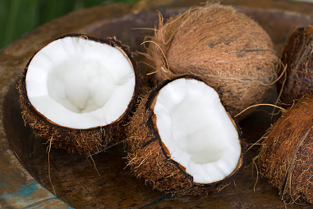 istock Coconut on a wooden background 484132030