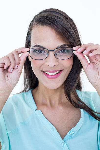 istock Pretty woman holding her eyeglasses 484132330