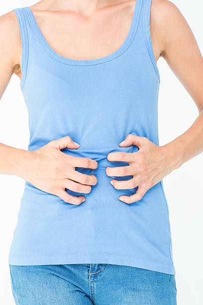 istock Woman suffering from stomach pain 484132496