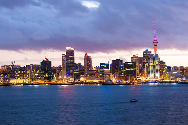 Auckland skyline Skyline photo of the biggest city in the New Zealand, Auckland. The photo was taken after sunset across the bay Waitemata Harbor stock pictures, royalty-free photos & images