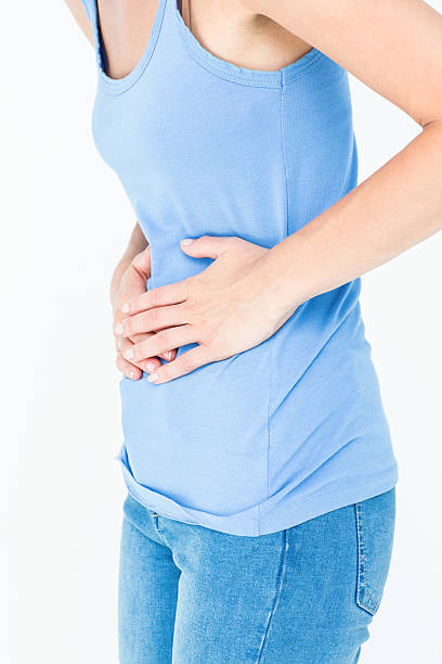 istock Woman with stomach pain 484134070