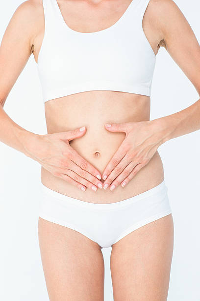istock Woman suffering from stomach pain 484134118