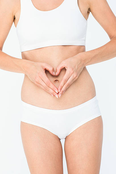 istock Woman suffering from stomach pain 484134130