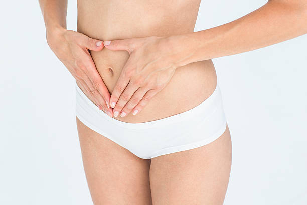 istock Woman suffering from stomach pain 484134134