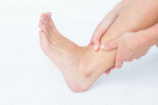 istock Woman with ankle pain 484134408