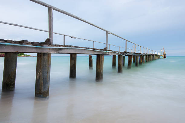 istock Side view of Wood Bridge on the beach 484136940