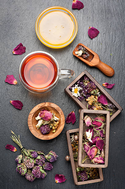 istock herbal tea with honey and dried herbs and flowers 484139516