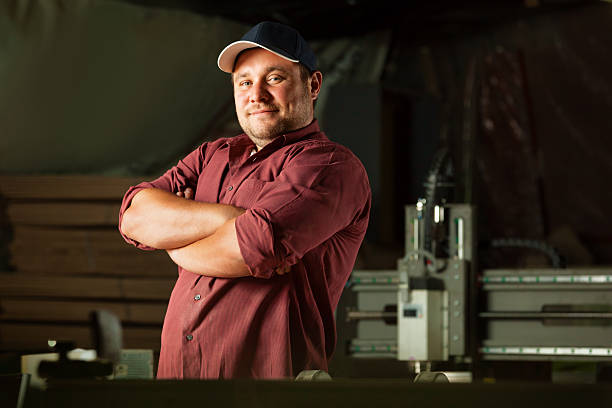 istock Portrait of happy professional carpenter. 484144452