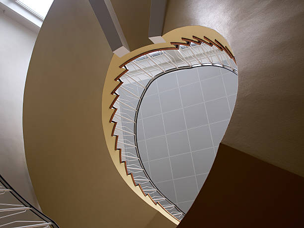 istock Upside view of a spiral staircase 484149610