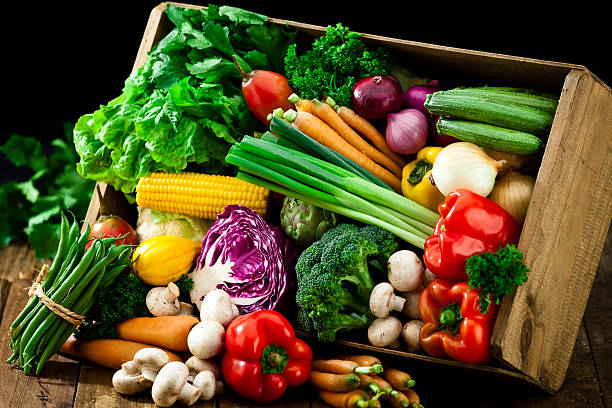 istock Wooden crate filled with fresh organic vegetables 484152000