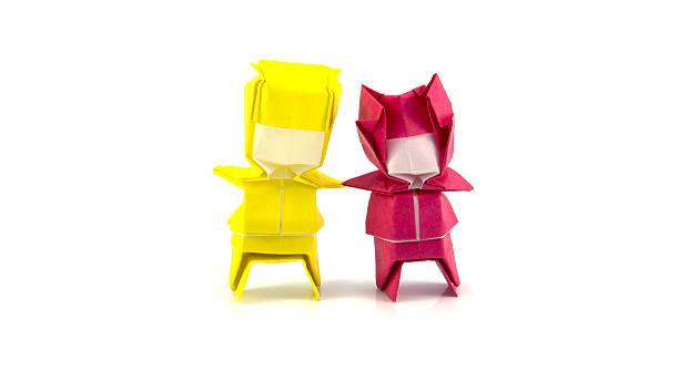 istock origami yellow and red boy 484152072
