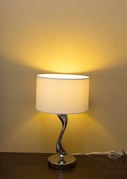 istock electricity lamp on wood table bedside 484156508