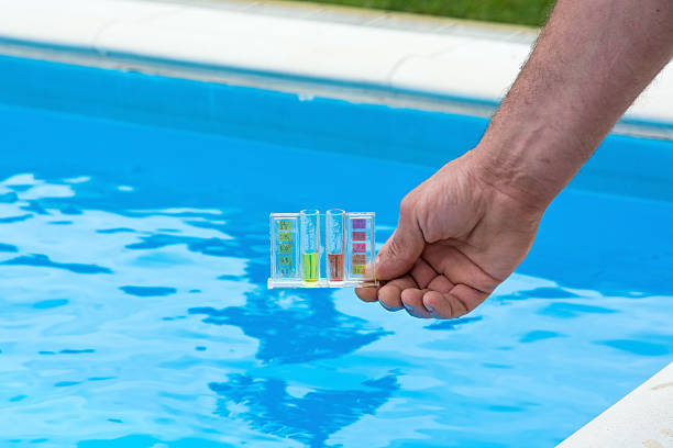 Pool water testing stock photo