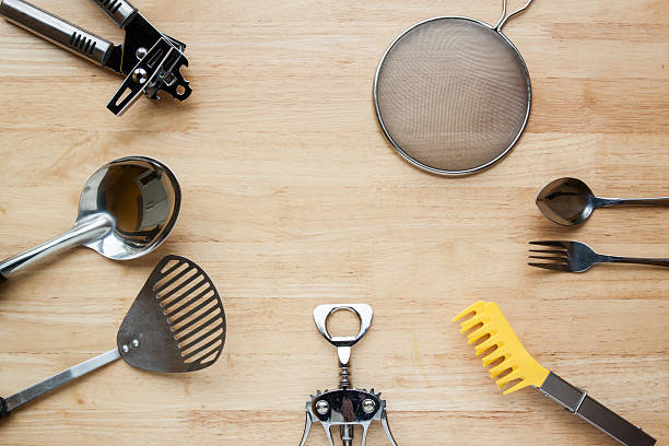 istock Stainless Steel kitchenware on wooden table 484161736