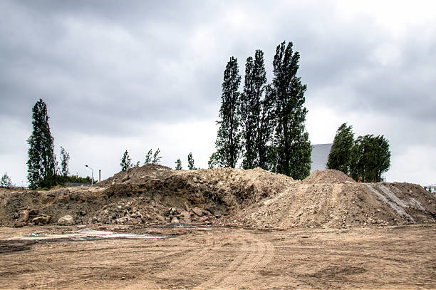 istock Piles of sand and dirt at construction works 484161830