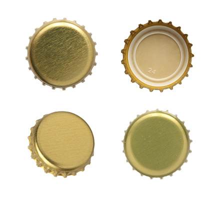 Set of beer caps on a white background.