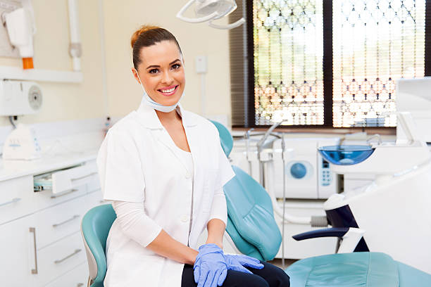 istock female dentist in office 484162964