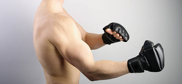 istock Ultimate fight. Fighter with boxing gloves 484164976