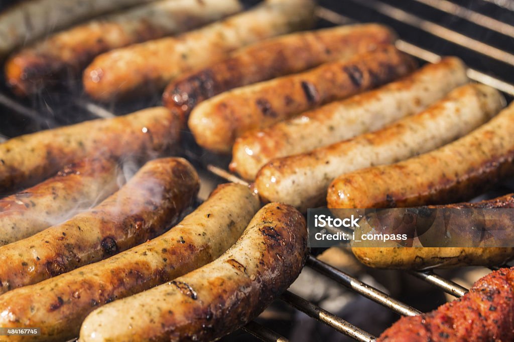 Barbecue barbecue in Germany with sausages, steaks and potatoe salad Sausage Stock Photo