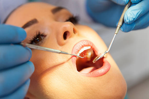 istock young woman dental checkup 484167838