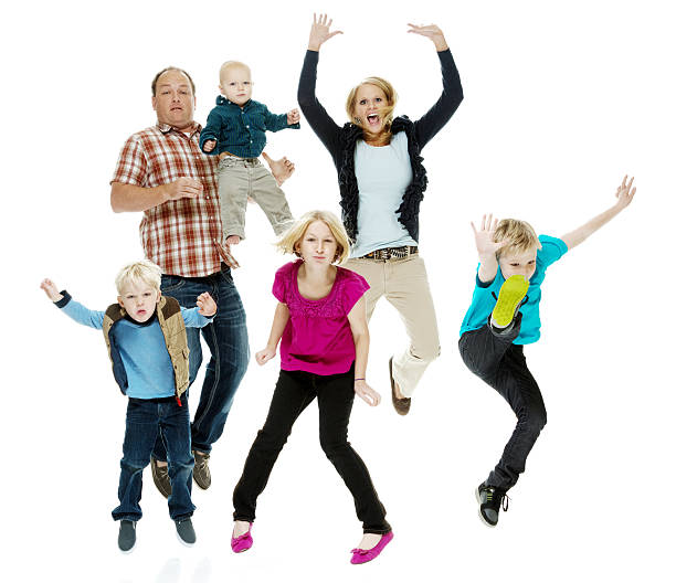 istock Happy family jumping 484168158