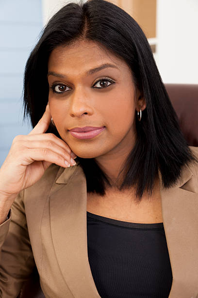 istock Indian descent business woman in office setting. 484168576