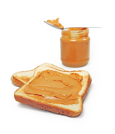 Peanut butter and toast, isolated on white