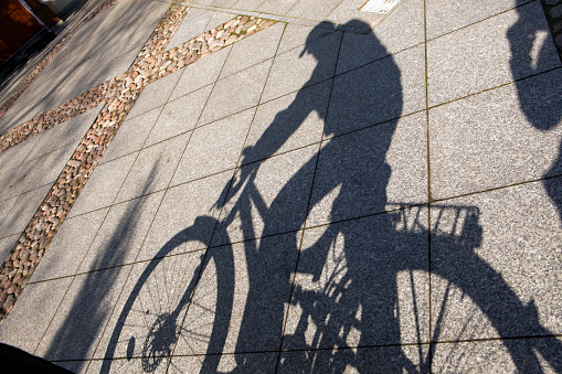 Shadow bikes on a sunny day