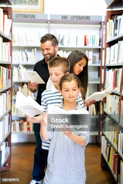 In Library Stock Photo - Download Image Now - Adult, Book, Bookshelf
