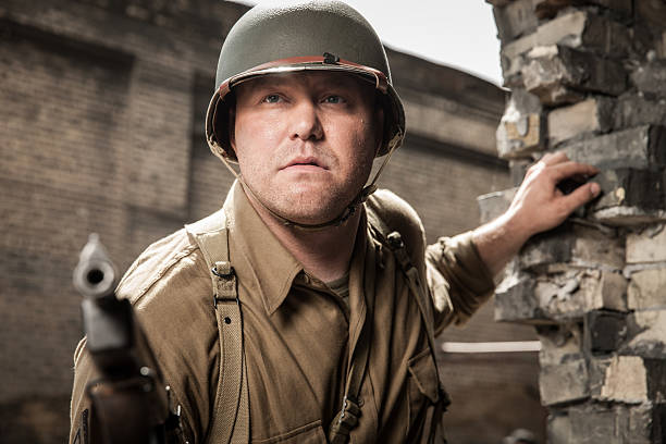 istock WWII Submachine Gunner Sneaks Up on Enemy Outpost 484170110