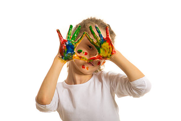 istock Girl with painted fingers frame her eye 484170319