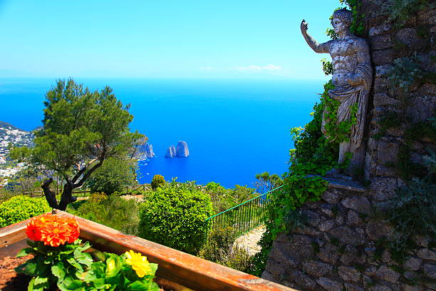 Capri island panorama from Mount Solaro, Faraglioni and Tyrrhenian sea, Bay of Naples, Italy.