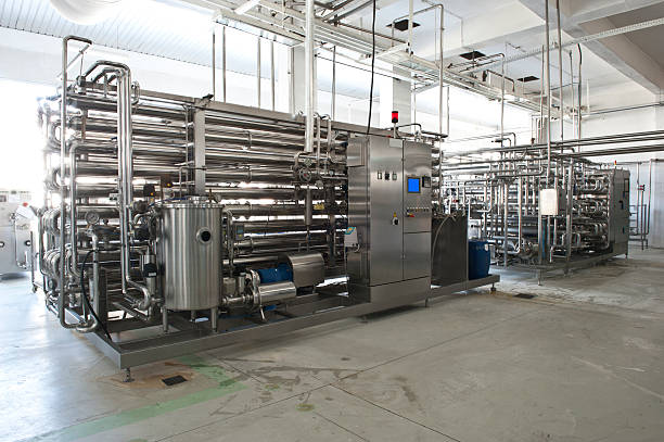 Milk and Ice Cream Factory Milk pasteurization machine pasteurization stock pictures, royalty-free photos & images