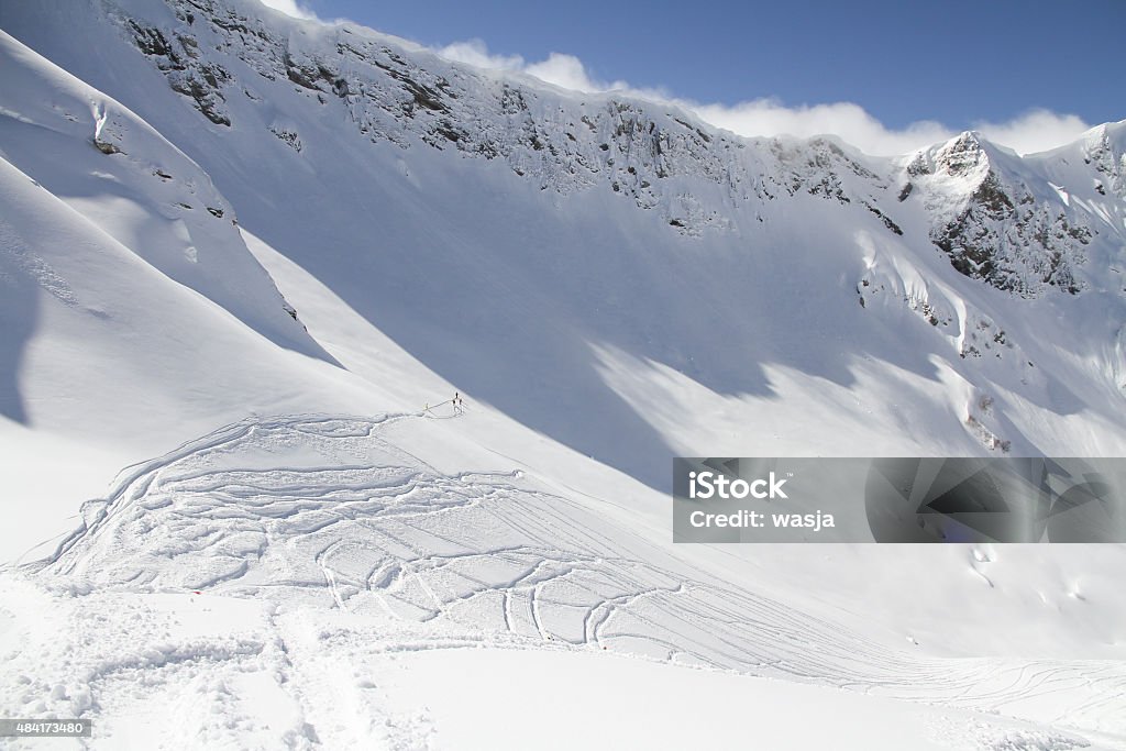 Freeride, tracks on a slope Extreme Freeride, tracks on a mountain slope. 2015 Stock Photo