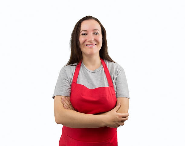 istock woman with apron smiling 484187884