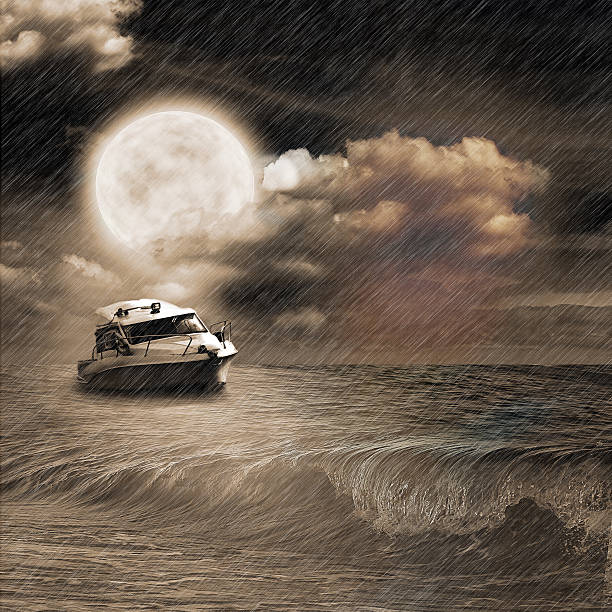 istock Boat in storm  evening on ocean and the moon 484188447